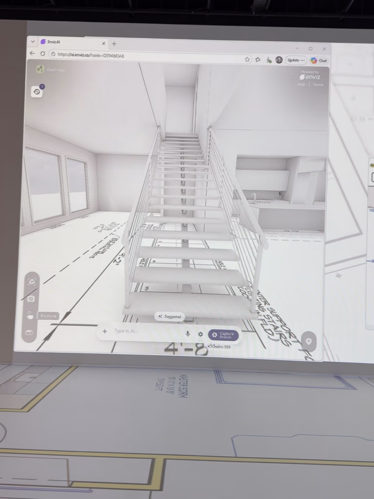 A 3D interior rendering showing a modern staircase visualized in mixed reality
