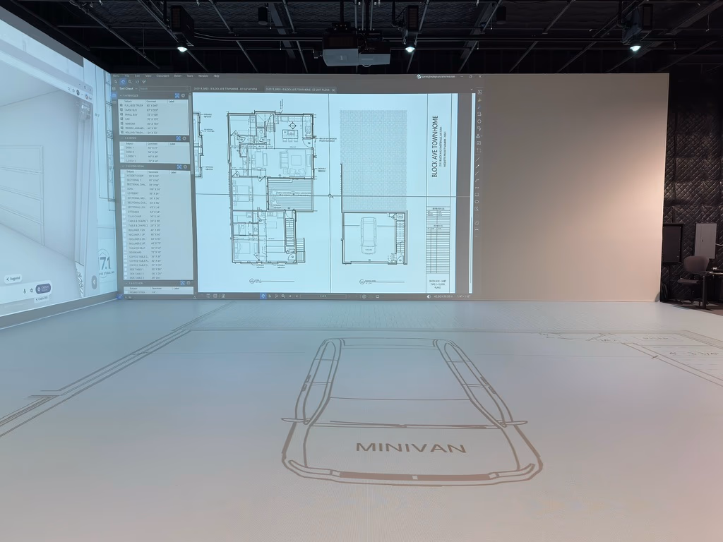 A townhome floor plan with a minivan outline shown for spatial reference